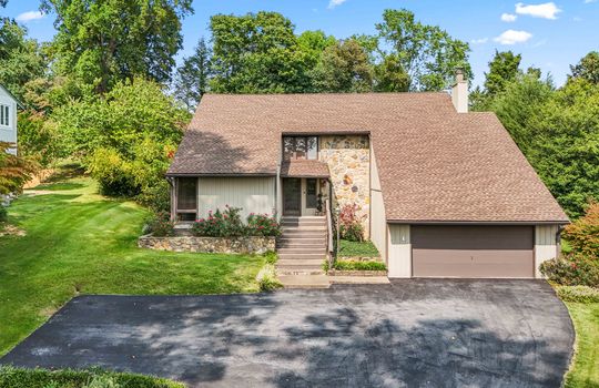 2 story, contemporary home, vinyl siding, driveway, garage, front door, vinyl siding, stone, landscaping, trees