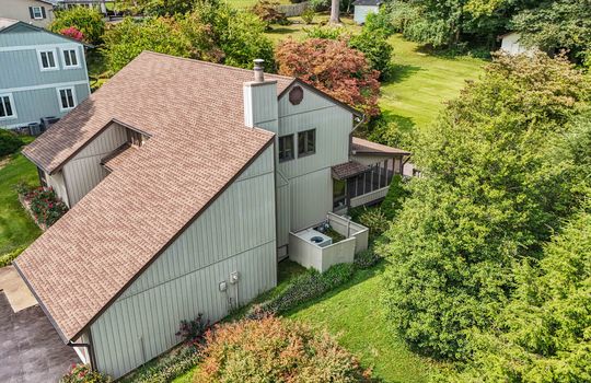 side view, contemporary home, vinyl siding, back deck, side yard, back yard, trees, landscaping