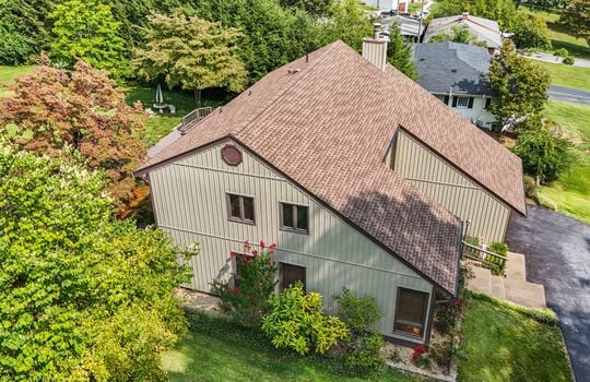 side view, contemporary home, vinyl siding, back deck, side yard, back yard, trees, landscaping