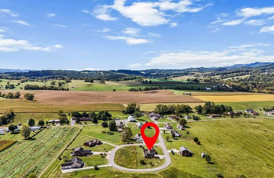 aerial view of neighborhood, home, mountains, property marker