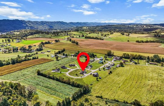 aerial view of neighborhood, home, mountains, property marker