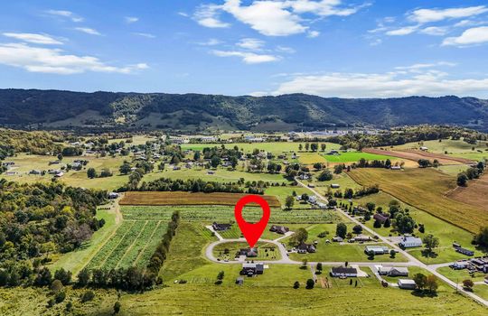 aerial view of neighborhood, home, mountains, property marker