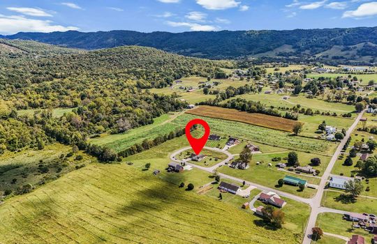 aerial view of neighborhood, home, mountains, property marker