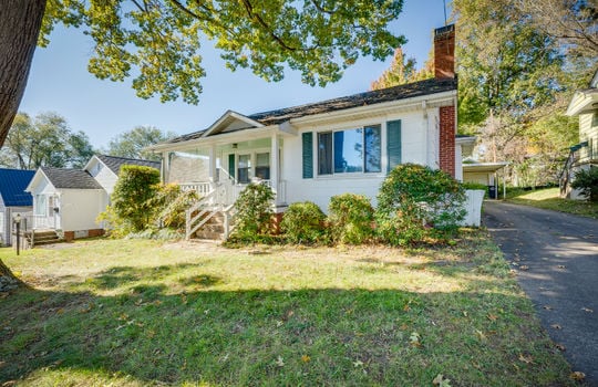 front yard, landscaping, one level bungalow, picture window, front porch, stairs