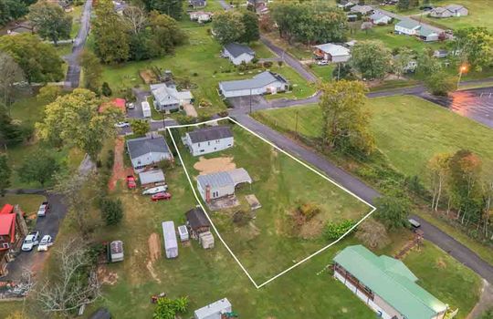 aerial view of neighborhood, property outline, neighboring homes