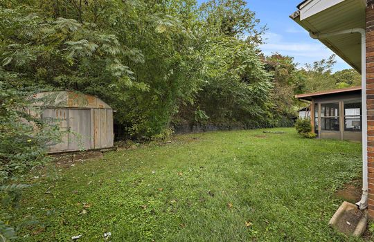 back yard, storage shed, covered back porch, enclosed back porch