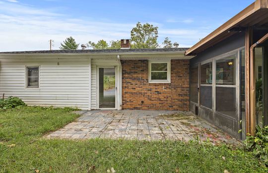 back yard, patio, door to carport, back yard