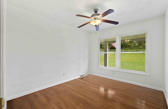 bedroom, ceiling fan, hardwood flooring, window