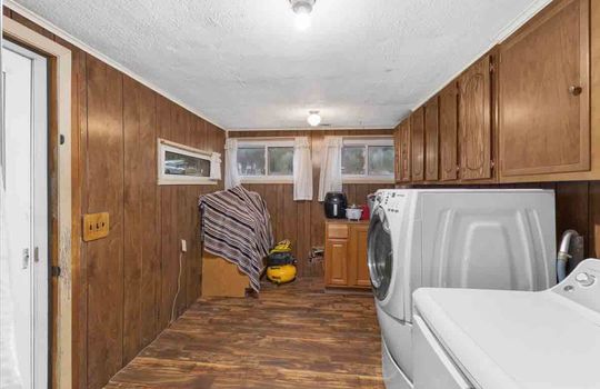 laundry area, hardwood flooring, windows