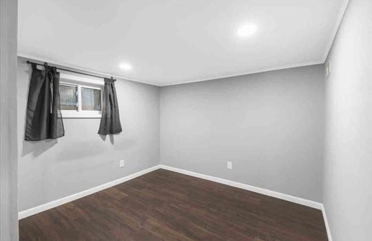 bedroom, laminate flooring, window, recessed lighting