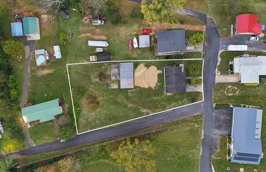 aerial view above home, home, garage, yard, property outline