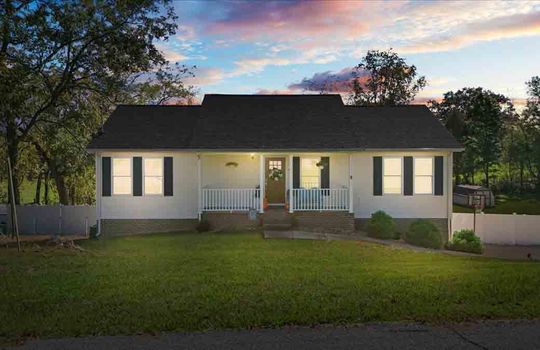 ranch style house, front yard, twilight photo, covered front porch, vinyl siding, front yard