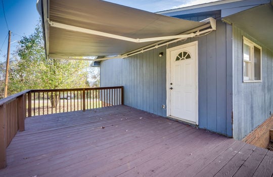 back deck, back door, railing, retractable covering