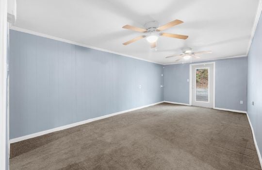 bedroom, ceiling fan, carpet, exterior door