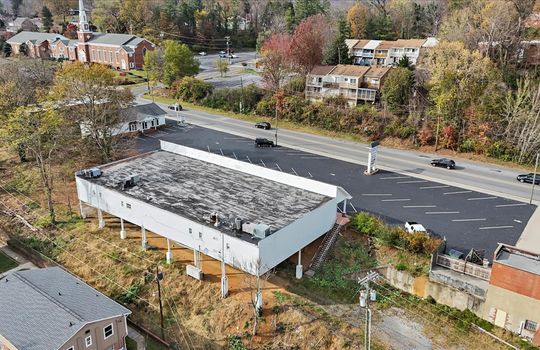 aerial view, back view, parking lot, roof, road