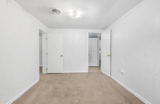 bedroom, carpet, closet, door to hallway