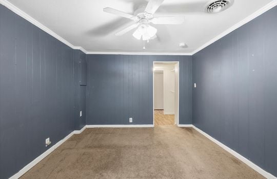 bedroom, painted paneling walls, ceiling fans, carpet