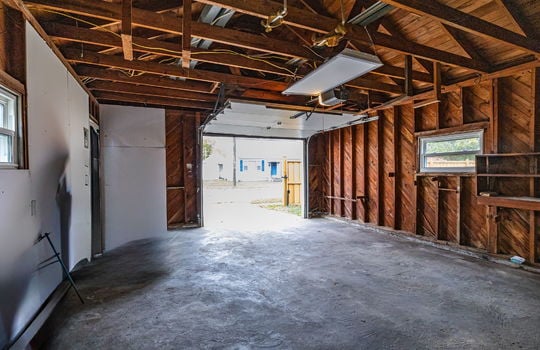 garage concrete flooring, garage door, exterior door