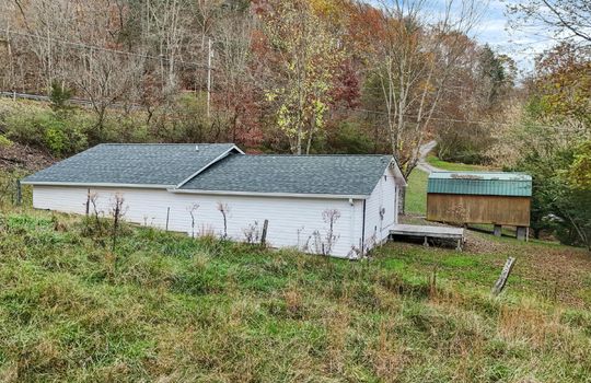 home, back of home, siding, back yard, storage shed