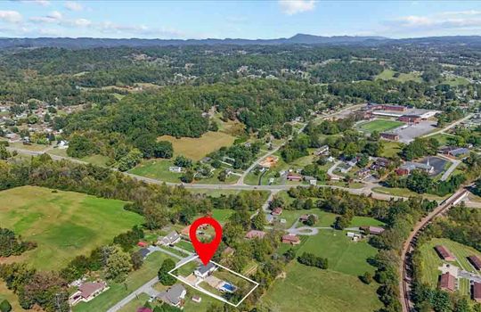 aerial view of neighborhood, property outline, property marker, neighboring homes, mountain views