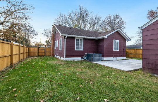 back of home, patio/parking pad