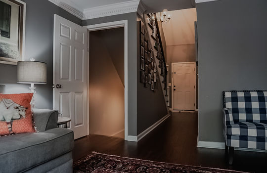 living room, stairs to garage level