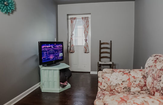 basement level sitting area, exterior door