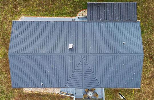 aerial photo, roof, metal roof, front yard, back yard, covered front porch, back deck