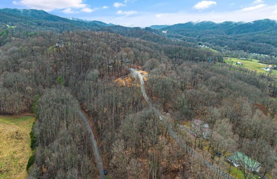 0.67 +/- acres, aerial photo, trees, mountain views, road