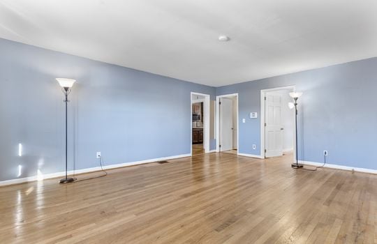 bedroom, hardwood flooring, closet, doorways