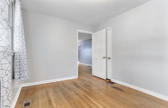 bedroom, closet, hardwood flooring, doorway