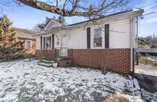 One Level Bungalow, sidewalk, stairs, front door, covered front porch, vinyl siding, brick, front yard, right side view