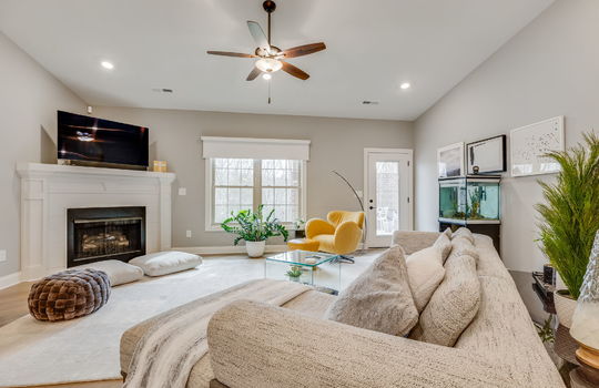 living room, ceiling fan, fireplace, window, door, luxury vinyl flooring, recessed lightings
