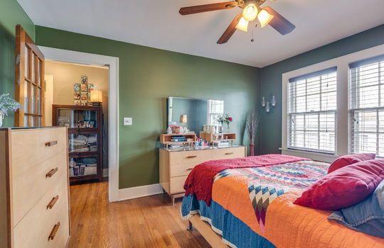 bedroom, hardwood flooring, windows, ceiling fan