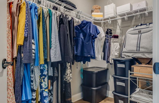 walk in closet, shelving, luxury vinyl flooring