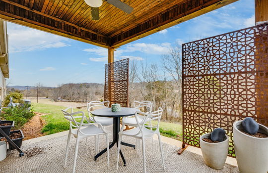 covered back deck, outdoor ceiling fan, concrete pad, patio
