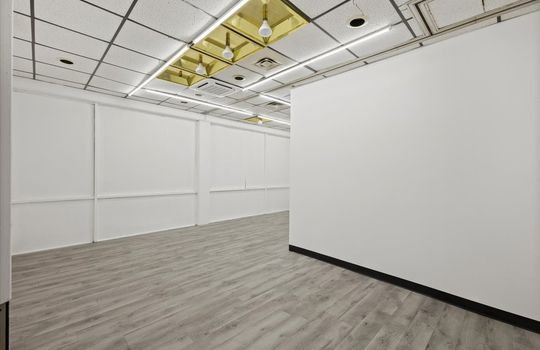 office/storage room, door, ceiling tiles, fluorescent lighting