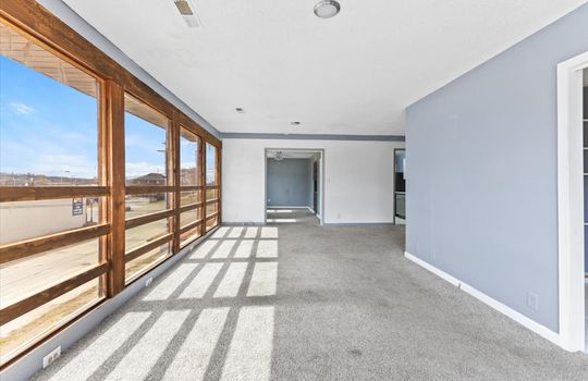 Living room, tall windows, carpet