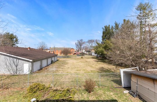 rental property, back yard, fence, neighboring properties