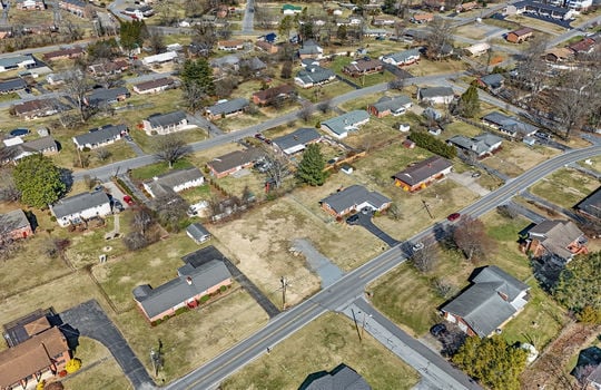 aerial view, 0.37+/- acres, road, neighboring properties