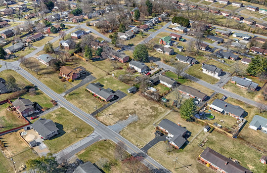 aerial view, 0.37+/- acres, road, neighboring properties