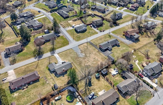 aerial view, 0.37+/- acres, road, neighboring properties