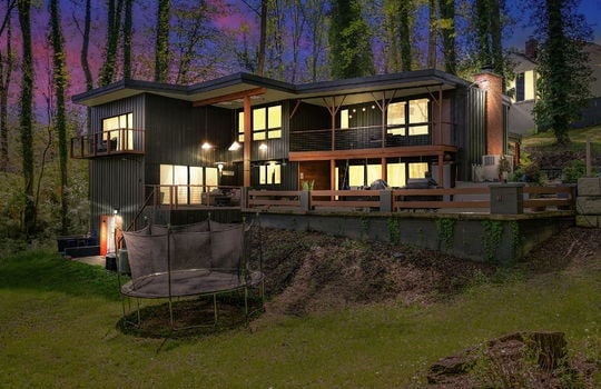 twilight photo, back yard, contemporary home, decks, balcony