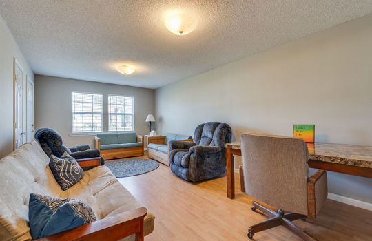 waiting area, windows, door, laminate flooring