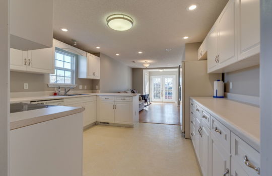kitchen, cabines, countertops, refrigerator, oven/range, sink, dishwasher, recpetion/waiting area