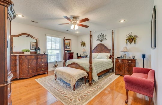 bedroom, hardwood flooring, ceiling fan, recessed lighting