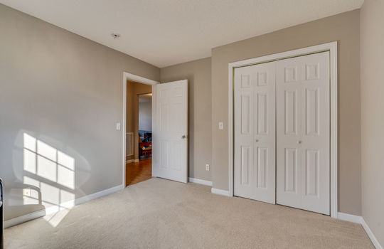 office space, carpet, closet, folding closet doors