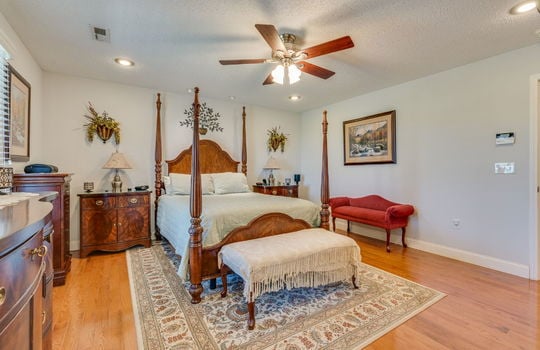 bedroom, ceiling fan, recessed lighting, hardwood flooring