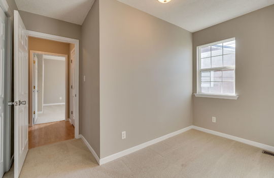 office space, view into separate office space, window, closet doors, hallway