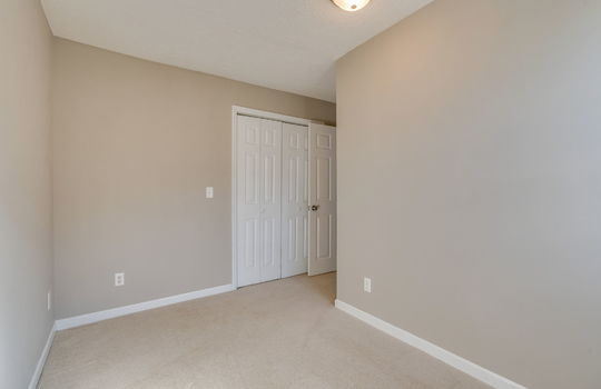 Office space, carpet, closet, folding closet doors